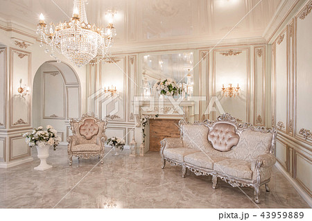 daylight in the interior and light of electric lamps. Morning in luxurious light interior in mansion daylight in the interior and light of electric lamps. Morning in luxurious light interior in mansion 43959889