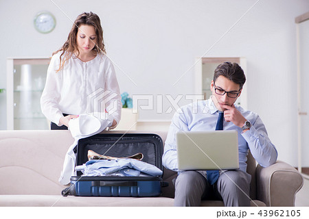 Wife seeing her husband off to business trip Wife seeing her husband off to business trip 43962105