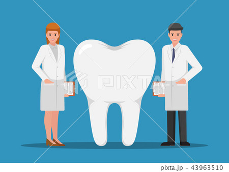 Male and female dentist standing with big tooth Male and female dentist standing with big tooth 43963510