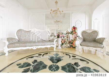 Morning in luxurious light interior in mansion . Bright and clean interior design of a luxury living Morning in luxurious light interior in mansion . Bright and clean interior design of a luxury living 43963619