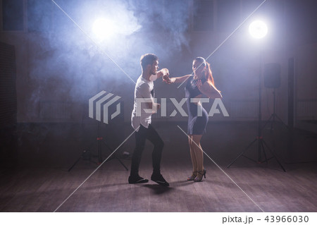 Young couple dancing latin dance Bachata, merengue, salsa. Two elegance pose in dance class 43966030
