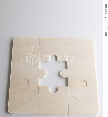 Last piece of wooden jigsaw is for business  43966466