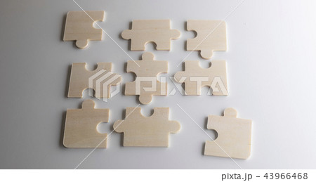 Last piece of wooden jigsaw is for business  43966468