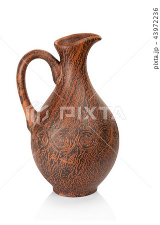 Clay jug isolated on white background Clay jug isolated on white background 43972236
