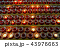 Many lighted candles in candlesticks. Sacred light 43976663