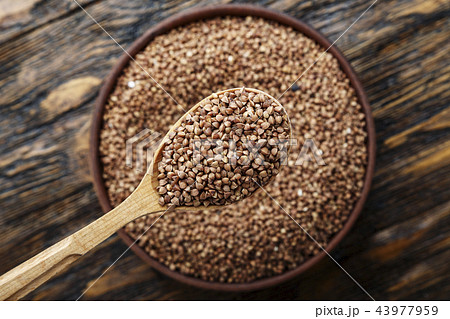 raw buckwheat in a plate 43977959