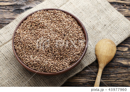 raw buckwheat in a plate 43977960