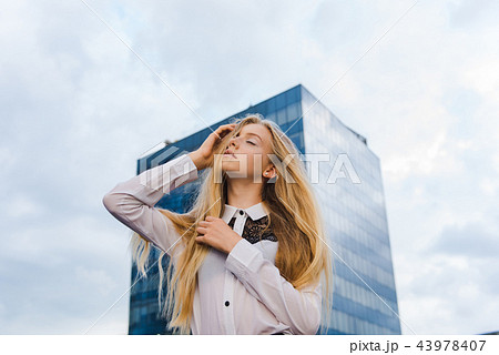 Fashion portrait of girl at downtown background 43978407