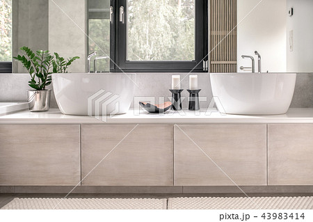 Stylish bathroom in modern style with different walls Stylish bathroom in modern style with different walls 43983414