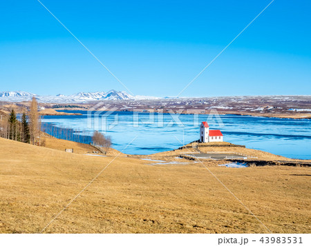 Ulfljotfvatnskirkja, church on lake, Iceland Ulfljotfvatnskirkja, church on lake, Iceland 43983531