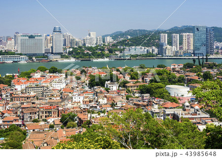 aerial view of Gulangyu island with Xiamen skyline aerial view of Gulangyu island with Xiamen skyline 43985648