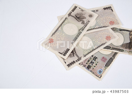 Japanese Yen bills on white 43987503