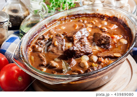 Beef Bourguignon stew in a casserole dish Beef Bourguignon stew in a casserole dish 43989080