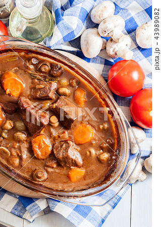 Beef Bourguignon stew in a casserole dish 43989082