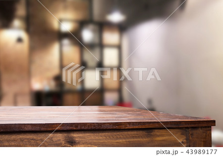 Selected focus empty brown wooden table and Coffee shop or resta Selected focus empty brown wooden table and Coffee shop or resta 43989177