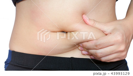 woman hand catching fat body belly paunch woman hand catching fat body belly paunch 43993129