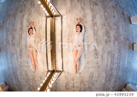 Young sexy bride posing near the mirror 43993239