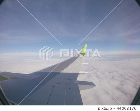 Aiplane Aircraft windows view on the wing aircraft, airlines , aviation skyline transportation 44003176