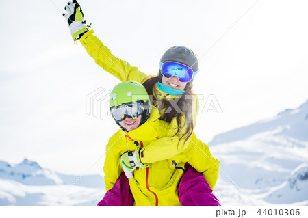 Photo of Funny sporty woman and man against backdrop of mountains Photo of Funny sporty woman and man against backdrop of mountains 44010306