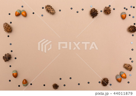 Autumn themed background border on brown paper 44011879