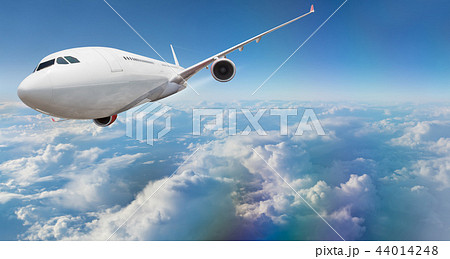 Commercial airplane flying above clouds. Commercial airplane flying above clouds. 44014248