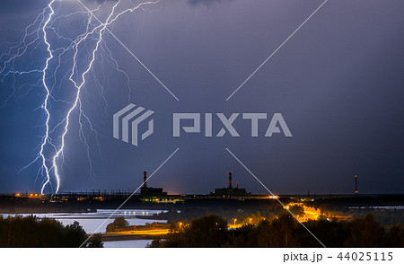 Thunderstorm above power plant Thunderstorm above power plant 44025115