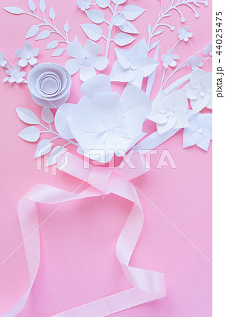 frame with white paper flowers. Cut from paper. 44025475