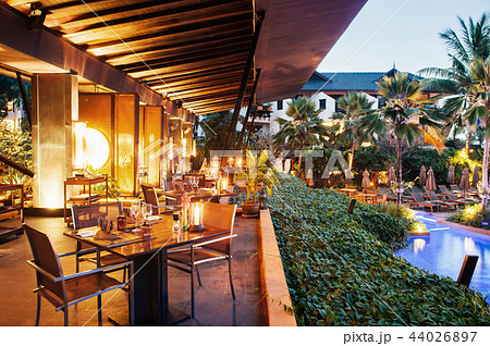 Luxury resort restaurant dinner table and seats 44026897