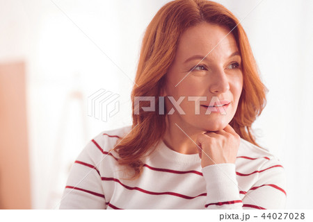 Nice mid aged woman feeling delighted Nice mid aged woman feeling delighted 44027028