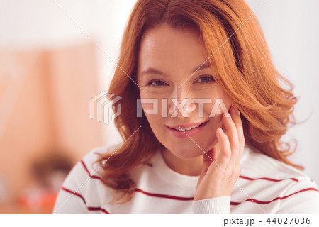 Pleasant woman expressing positive emotions 44027036