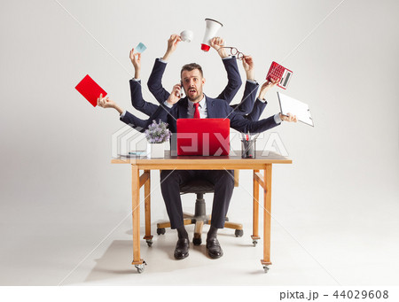 businessman with many hands in elegant suit working with paper, document, contract, folder, business businessman with many hands in elegant suit working with paper, document, contract, folder, business 44029608