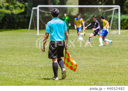 Soccer or football lineman referee watching game Soccer or football lineman referee watching game 44032482