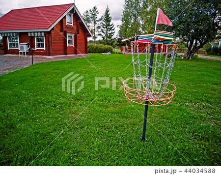 Disk in a disk golf basket 44034588
