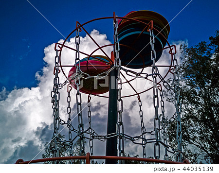 Disk in a disk golf basket Disk in a disk golf basket 44035139
