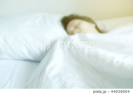 Abstract blur woman sleeping on the bed Abstract blur woman sleeping on the bed 44036004