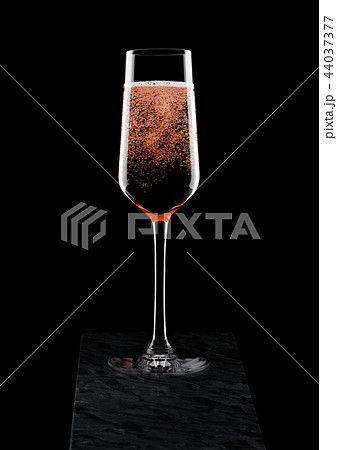 Elegant glass of pink rose champagne with bubbles Elegant glass of pink rose champagne with bubbles 44037377