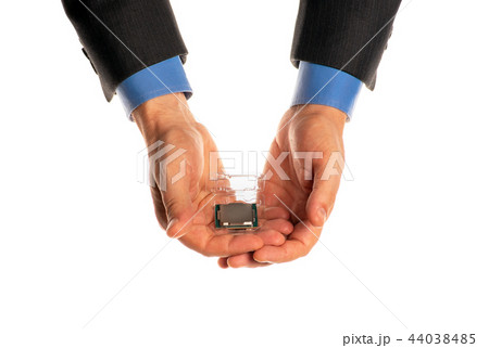 CPU device in the hands, isolated on a white 44038485