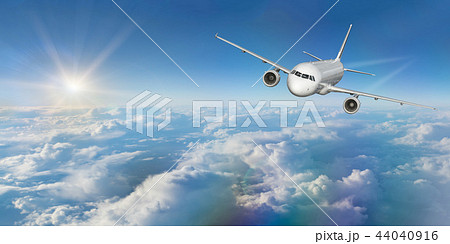 Commercial airplane flying above clouds. Commercial airplane flying above clouds. 44040916
