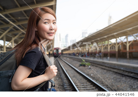Young woman traveler in train station  44041546