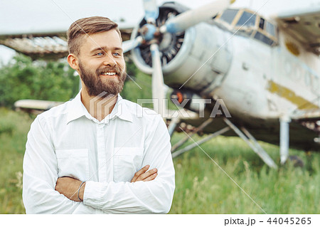 a man on the background of an old plane 44045265
