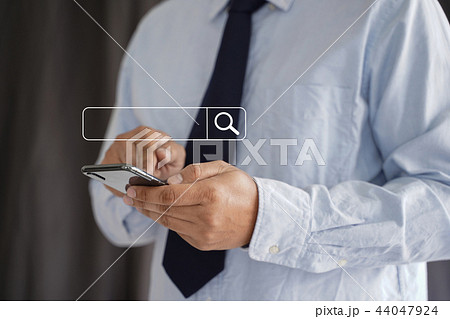 Businessman using Searching Browsing Internet Businessman using Searching Browsing Internet 44047924
