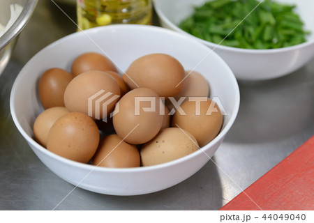 eggs in white bowl 44049040