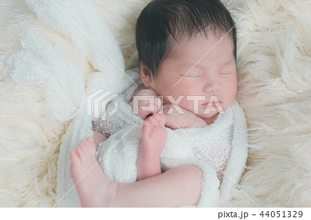 at the age of 14 days 44051329