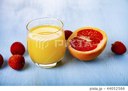 Glass of juice, grapefruit and lychee Glass of juice, grapefruit and lychee 44052566