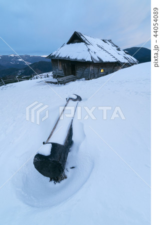 Old wooden house in the mountains Old wooden house in the mountains 44054089
