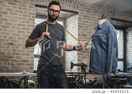 Fashion designer working in his studio 44054223