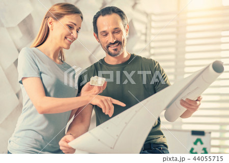 Beautiful young female standing near her partner 44055715