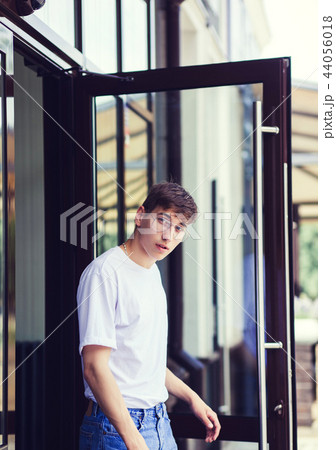 Handsome male model wearing white blank t-shirt 44056018