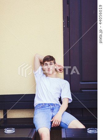 man wearing white t-shirt man wearing white t-shirt 44056019