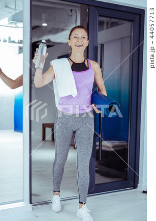 Exuberant mature woman preparing for exercises in gym 44057713